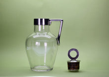 Load image into Gallery viewer, Edwardian sterling silver mounted Claret Jug in the manner of Dr Christopher Dresser