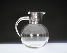 Load image into Gallery viewer, A Stylish Hukin & Heath silver plated claret jug after a design attributed to Dr Christopher Dresser .