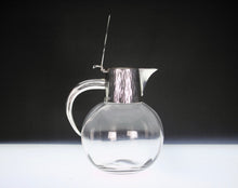 Load image into Gallery viewer, A Stylish Hukin & Heath silver plated claret jug after a design attributed to Dr Christopher Dresser .