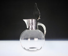 Load image into Gallery viewer, A Stylish Hukin & Heath silver plated claret jug after a design attributed to Dr Christopher Dresser .