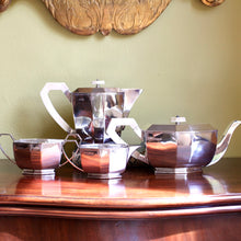 Load image into Gallery viewer, An Elizabeth II Art Deco style sterling silver four piece tea service.