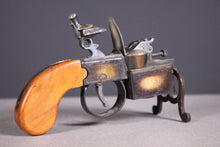 Load image into Gallery viewer, A Dunhill Tinder Pistol Cigar Lighter. Made in England, Mid 20th century.