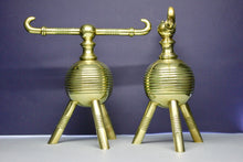 Load image into Gallery viewer, A pair of Brass Aesthetic Movement Fire Dogs. Designed by Dr Christopher Dresser made by Benham & Froud. English Circa 1880