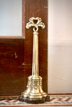 Load image into Gallery viewer, A Regency brass bell-shaped doorstop with acanthus handle. English Circa 1800
