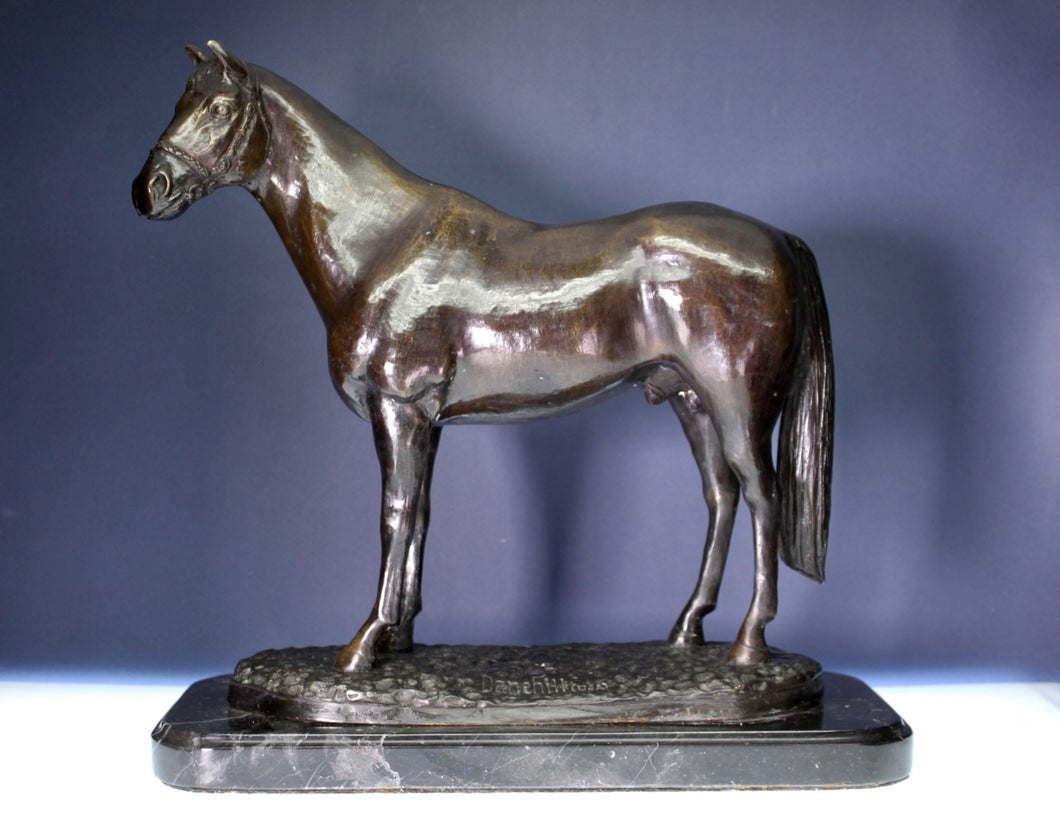 A Bronzed Spelter figure of the Thoroughbred Racehorse Danehill on a black marble base,