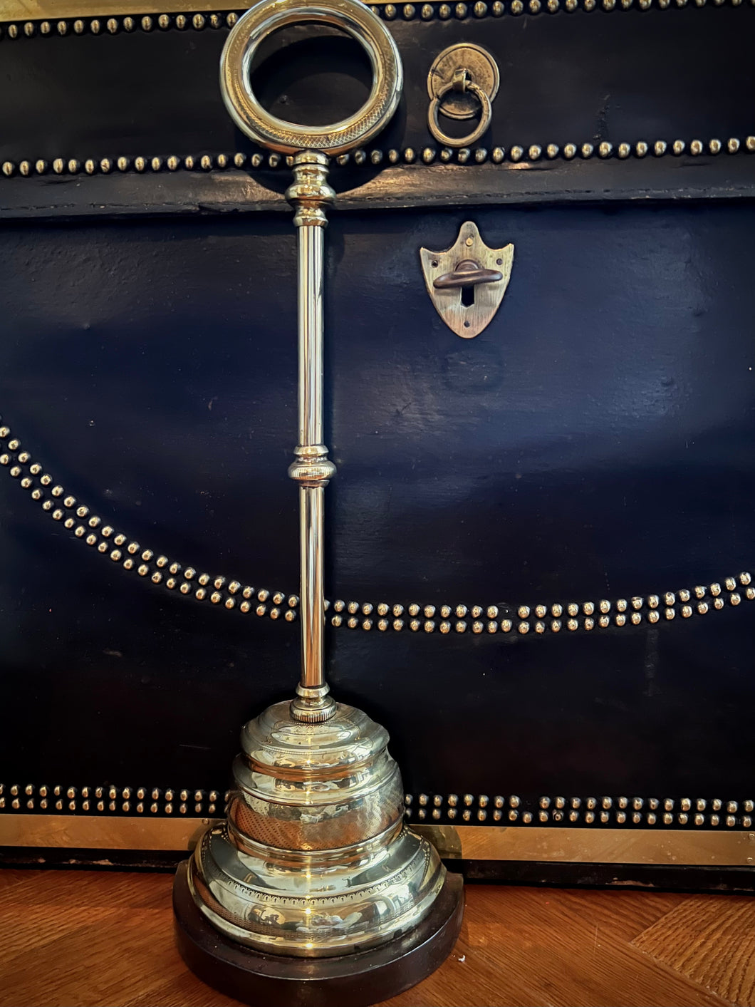 A Georgian brass bell-shaped doorstop. English Circa 1820