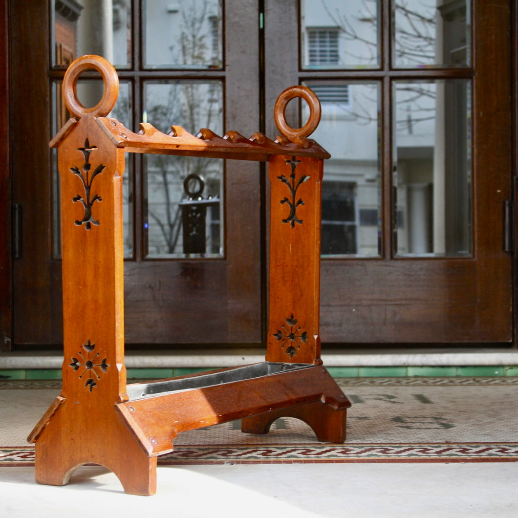 A 19th century walnut gothic style umbrella or stick stand. Attributed to E. W. Pugin and C & R Light. English Circa 1881