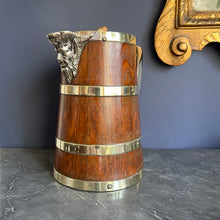Load image into Gallery viewer, A Hardy Brother's oak lidded  jug with plated brass mounts, ceramic liner. Circa 1880
