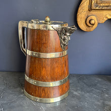 Load image into Gallery viewer, A Hardy Brother's oak lidded  jug with plated brass mounts, ceramic liner. Circa 1880
