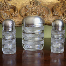 Load image into Gallery viewer, A set of three sterling silver lidded pots by Charles and George Asprey, London 1896
