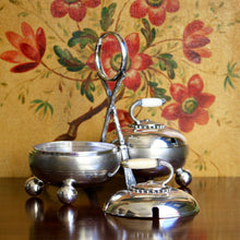 Load image into Gallery viewer, A Fenton Brothers Ltd silver plated double "curling stone" cruet stand. Sheffield circa 1875-1896
