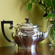 Load image into Gallery viewer, An Edwardian sterling silver teapot. Hallmarked Birmingham 1907
