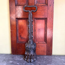 Load image into Gallery viewer, A Victorian cast-iron door stop/porter. English Circa 1850

