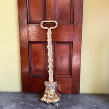 Load image into Gallery viewer, A Georgian lion's paw doorstop/porter. English circa 1820
