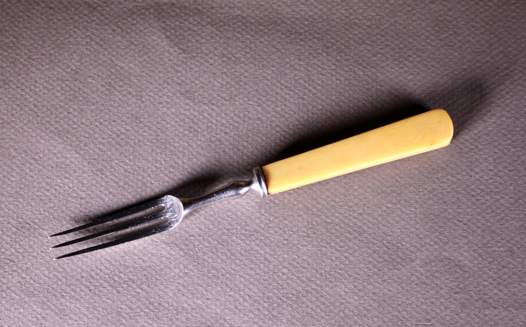 A 19th century silver-plated pickle fork, ivory handle