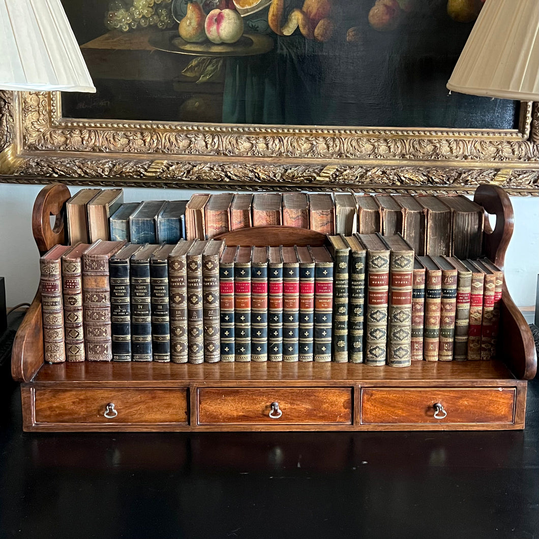A rare Georgian mahogany double sided, two handled book carrier/stand. English Circa 1820