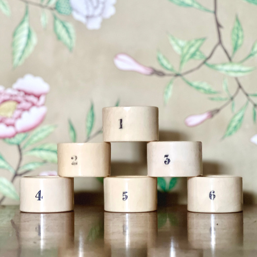 A set of six Edwardian numbered Ivory napkin rings Circa 1900