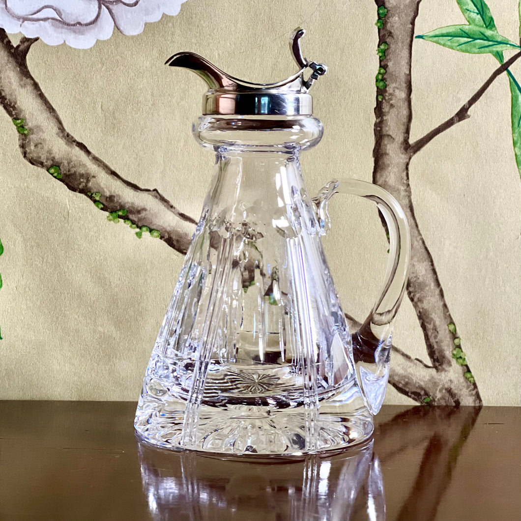 A sterling silver mounted cut crystal whisky noggin. Birmingham 1972