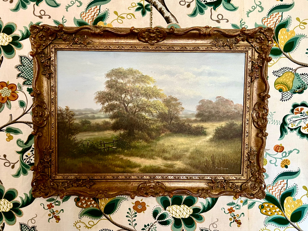 Reginald Brown British (1921- ) Framed oil on canvas, 'A Country Landscape'.