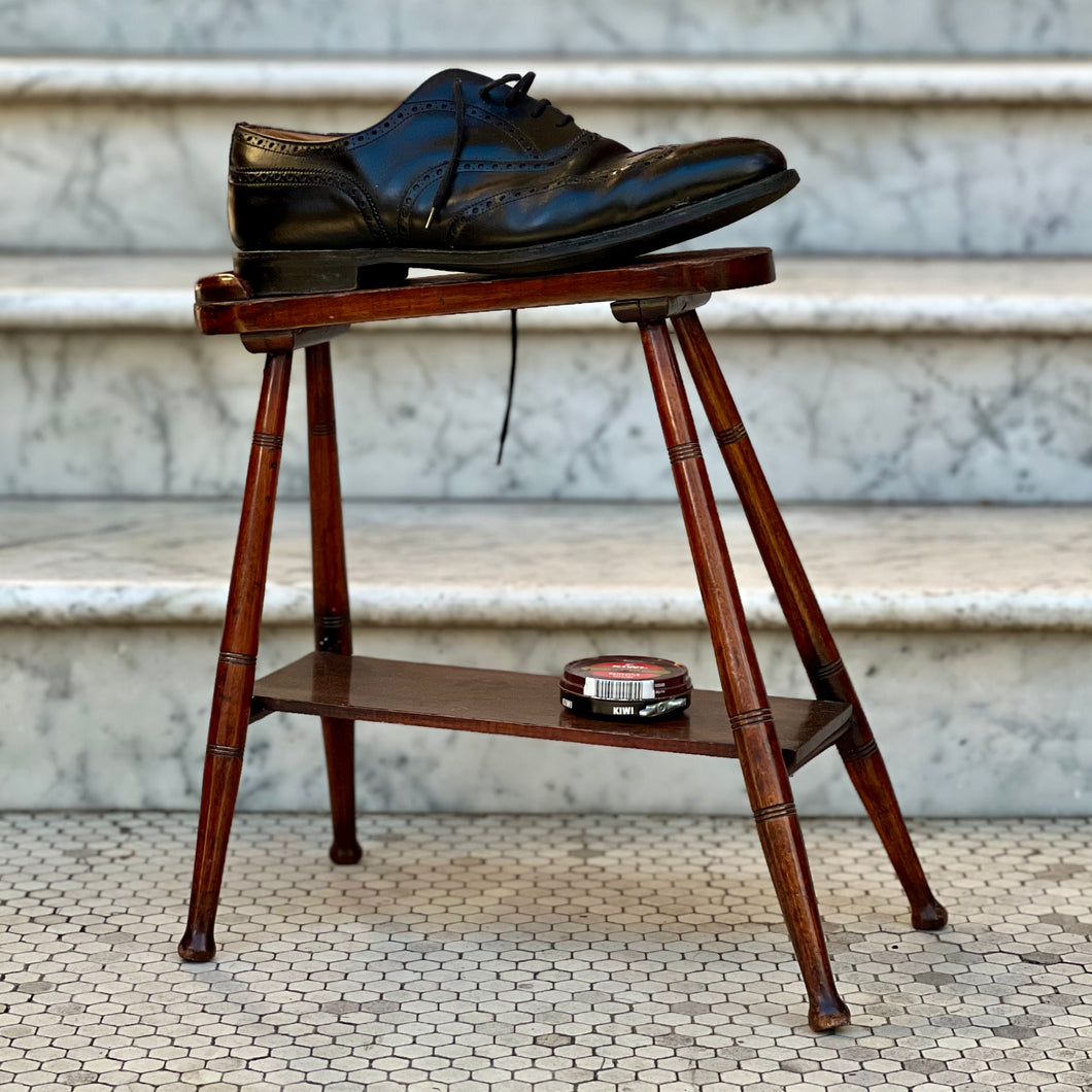 A mid century wooden shoeshine stool. Circa 1950