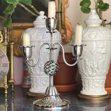 Load image into Gallery viewer, Christopher Dresser for Hukin and Heath a two branch, three light Silver Plated Candelabra. London circa 1880
