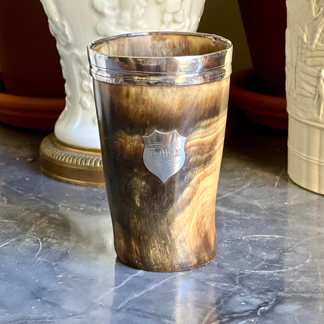 A Victorian horn beaker with sterling silver mounts. London 1868