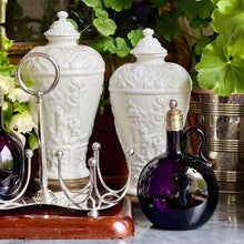 Load image into Gallery viewer, A 19th century silver plated twin bottle decanter stand on a carved cedar base. Circa 1880
