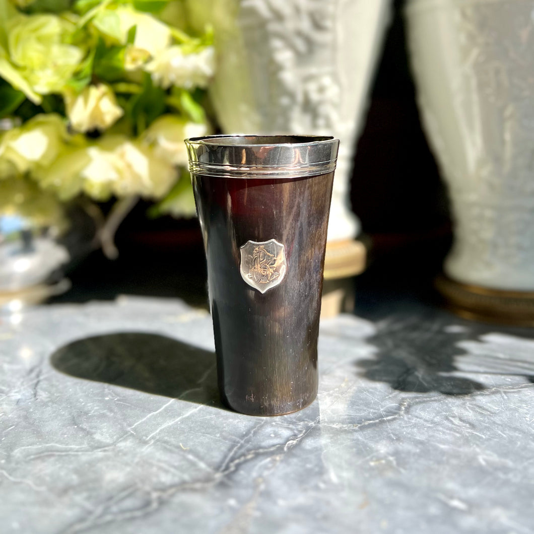 A Victorian sterling silver mounted dark horn beaker. London 1889