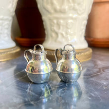 Load image into Gallery viewer, A pair of Edwardian sterling silver miniature &#39;Guernsey&#39; milk churn pepper pots. Birmingham 1913
