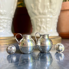 Load image into Gallery viewer, A pair of Edwardian sterling silver miniature &#39;Guernsey&#39; milk churn pepper pots. Birmingham 1913
