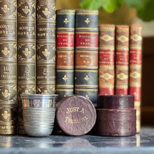 Load image into Gallery viewer, A silver plated leather cased Thimble Measure. Circa 1900

