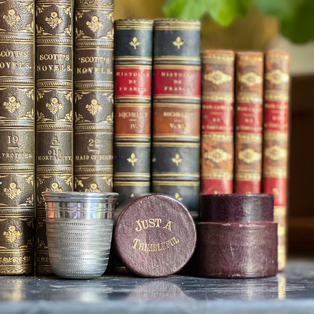 A silver plated leather cased Thimble Measure. Circa 1900