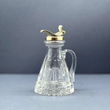 Load image into Gallery viewer, A sterling silver mounted cut crystal whisky noggin. Birmingham 1972
