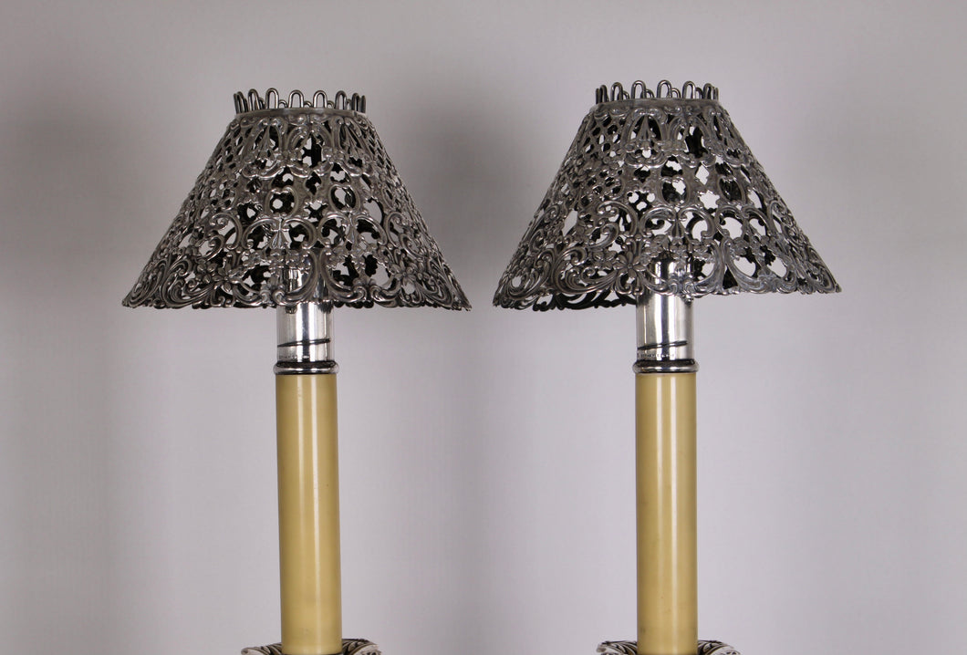 Pair of Gorham candlestick inserts with shades.