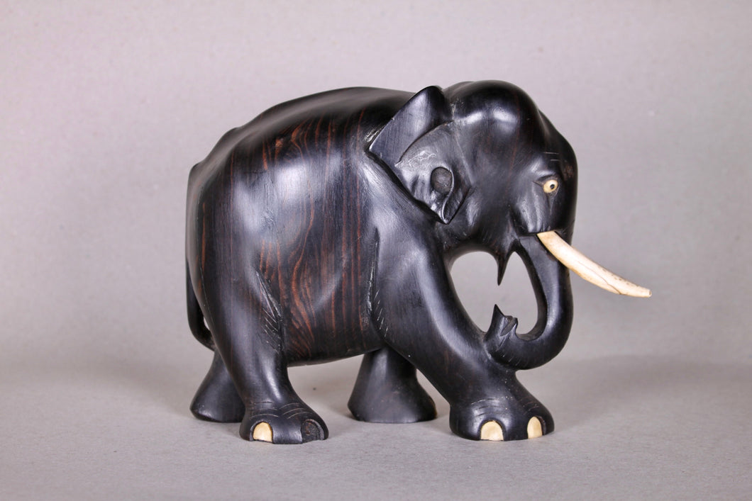 A carved Ebony Asian Elephant.