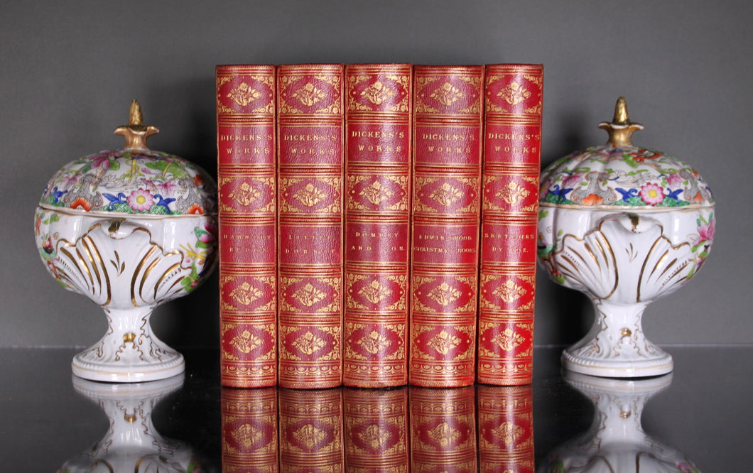 A five volume set of works by Charles Dickens. Published London 1870-74