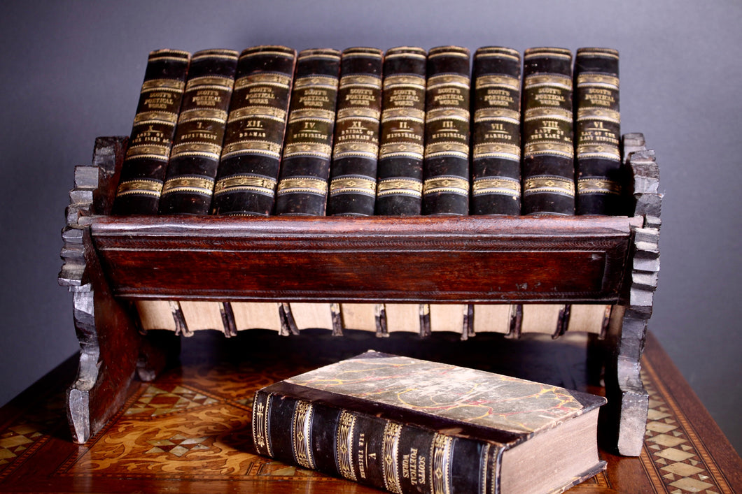 A carved Anglo Indian Rosewood book stand, circa 1880