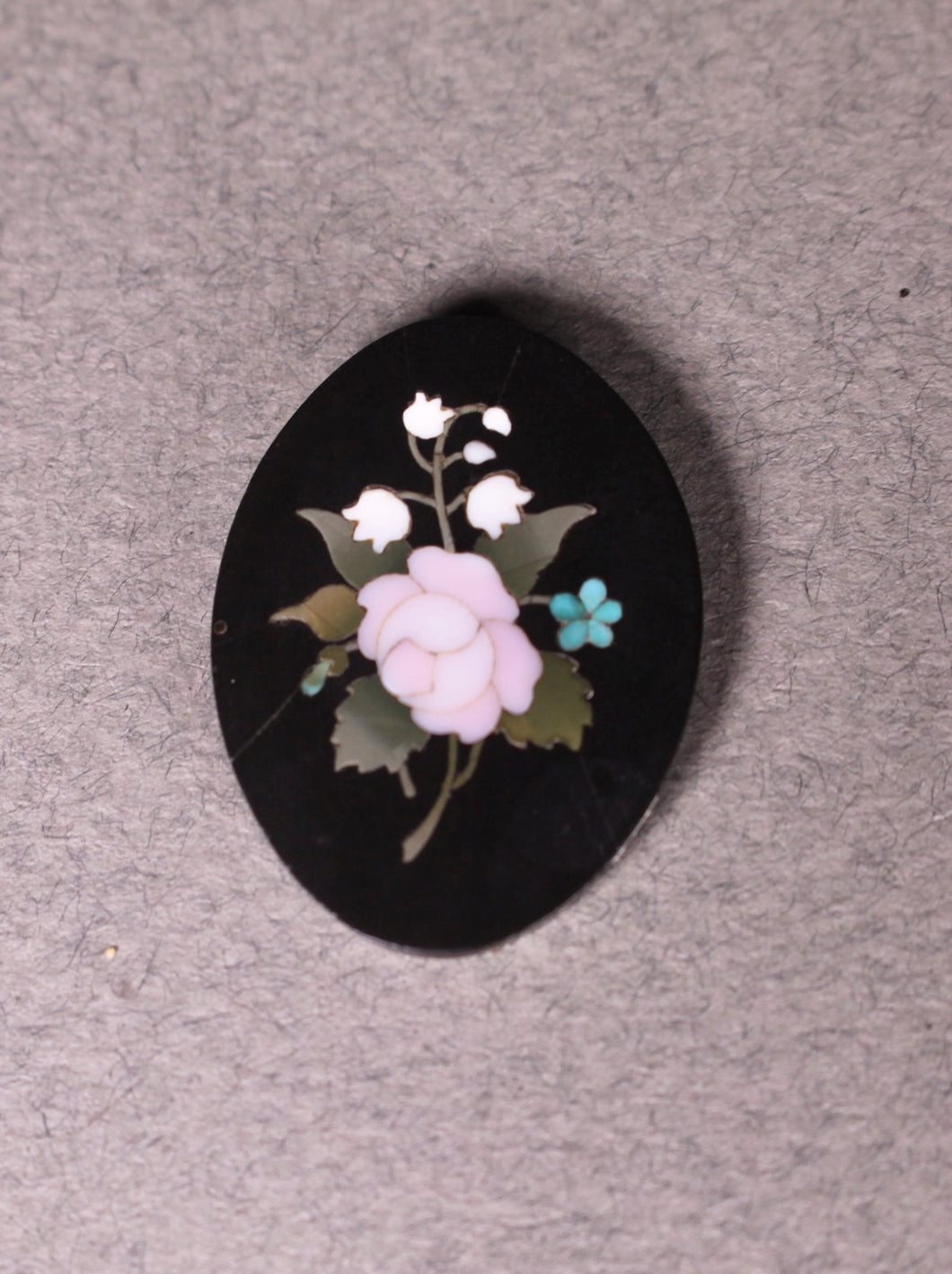 A 19th century Florentine oval pietra dura oval panel